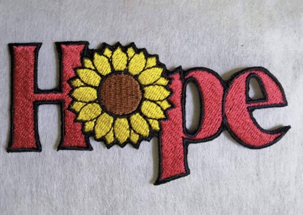 hwagaemarketpin's tweet photo. Design drop/interest check🌻:
Revised Hope flower patch sample pic from our manu. We decided to give this design another shot, & revised it to include a sunflower in place of the O. We honestly think the sunflower adds more to it while still remaining hobicore.
#hmpupdates #bts https://t.co/0RFbyZLllJ