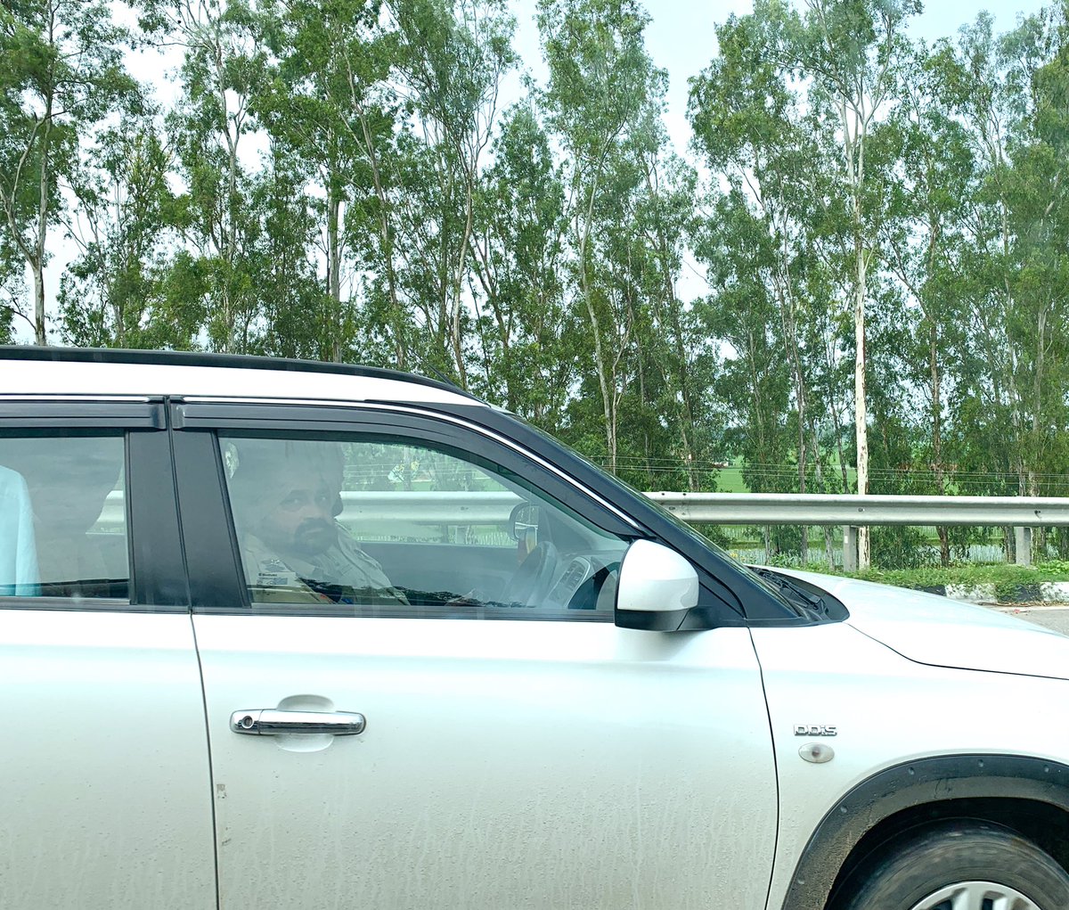The violation of #COVID__19 rules apply to general public only in #punjab  as Punjab Police doesn’t challan their own personnel’s. The pic says it all. 3 policemen without #masks sailing through the barrier near #rajpura 
<a href="/PunjabPoliceInd/">Punjab Police India</a> 
<a href="/DGPPunjabPolice/">DGP Punjab Police</a> 
<a href="/CMOPb/">Lucky Singh</a>