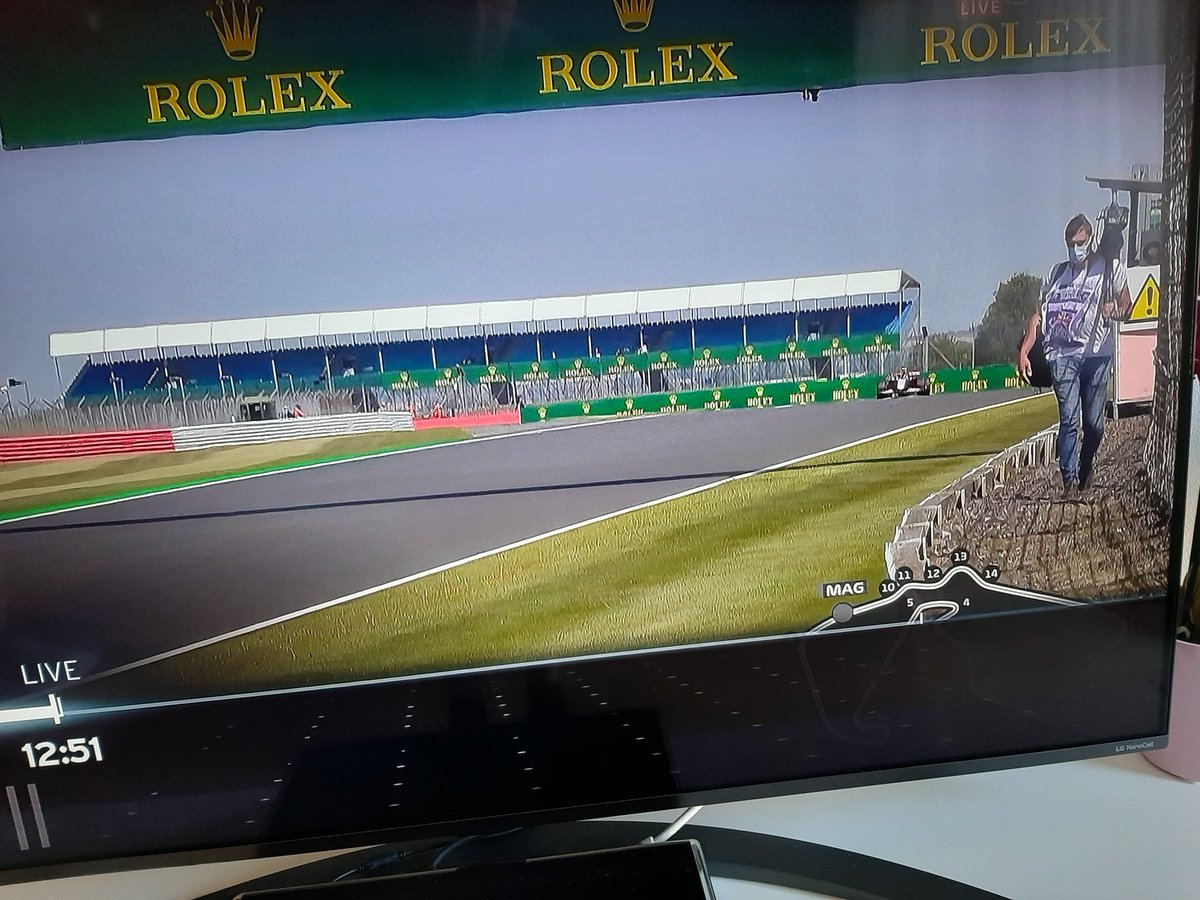 F1Reindeer's tweet photo. Urm... what is this ? A cameraman on the wrong side of the fence? @F1 #F1 #SilverstoneGP https://t.co/J8KAdsdAg6