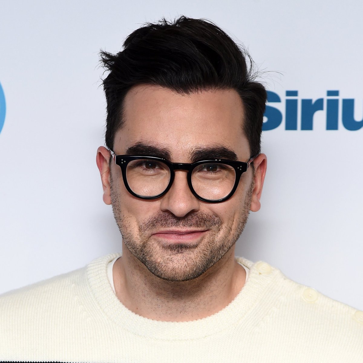 Dan Levy, but each time his smile gets a little bigger