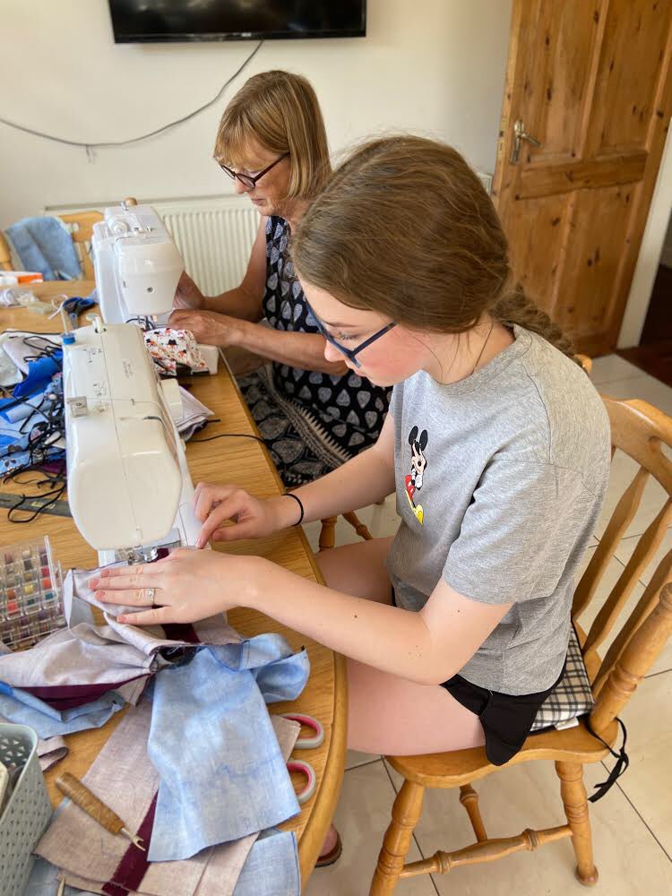 MaskEast's tweet photo. Massive congrats to members Leah &amp; her granny Mary. At 14 yrs old, Leah was compelled to make a LOT of masks for a fundraiser in memory of a young boy and family friend, Adam Lyons who tragically died recently. They gave ALL of their proceeds from their masks to Temple Street. https://t.co/tseasvfGYB