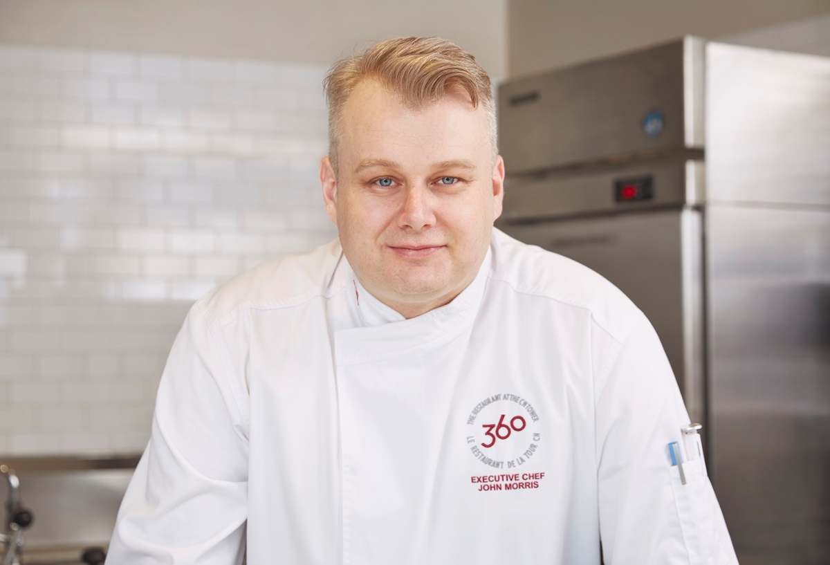 TourCNTower's tweet photo. Executive Chef of #CNTower's 360 Restaurant @ChefJohnMorris is feat. for #FoodDayCanada "Canadian food is taking the amazing produce and ingredients we have in Canada and preparing them in a way that speaks to and respects our mosaic of cultures and flavours" https://t.co/VKSUKN4ftL