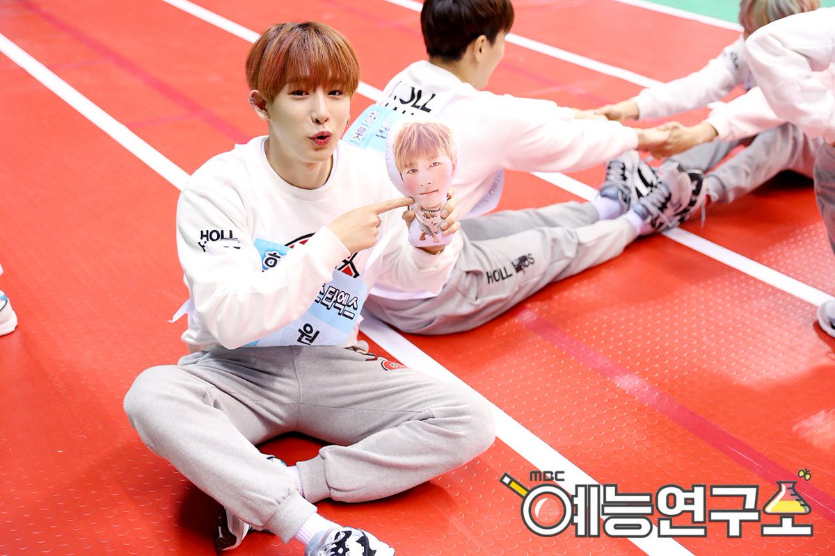 wonkyunarchive's tweet photo. wonho bringing changkyun pillow head with him everywhere bc kyun was injured at the time https://t.co/ThZLQaTCB4