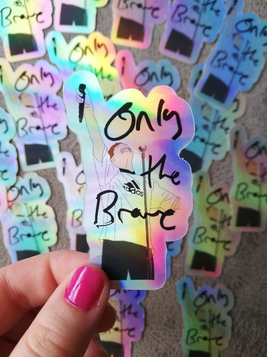 <a href="/Louis_Tomlinson/">Louis Tomlinson</a>'s holographic sticker inspired by this photo while he was singing Only The Brave at the Madrid concert #6MonthsOfWalls