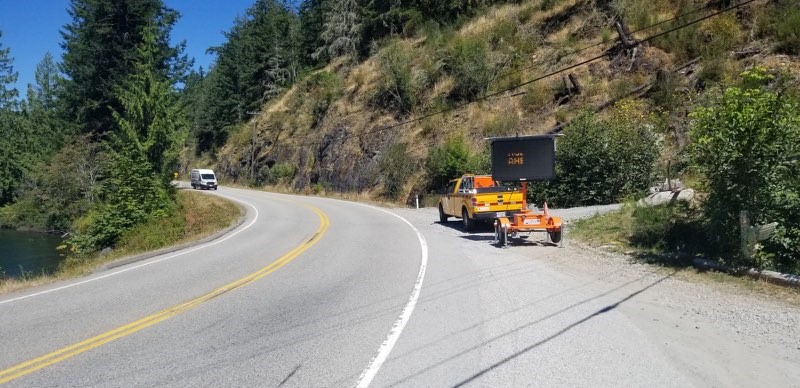 CapHwy's tweet photo. #BCHwy101 @ Dan Bosch Park - Please slow down in the area of #DanBoschPark &amp; #RubyLake. The area is congested  due to a high number of people visiting the lake.

Crews have a message board along Hwy 101 warning of CONGESTION AHEAD. Please Slow Down.
@COAST_RCMP @RubyLakeResort https://t.co/jiboMFIuID