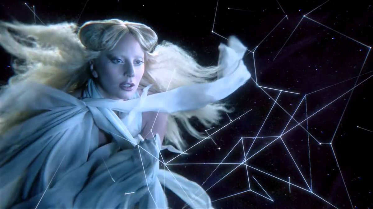 On January 6, 2016, a mysterious video was released by the technology company Intel in which they announced a creative collaboration with Lady Gaga for that year's Grammy Awards, which would culminate with a performance on the stage of the event.