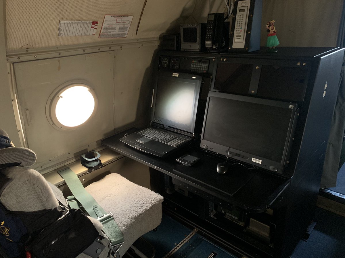 Behind them sits the flight director, our onboard meteorologist, who coordinates between what the scientists want to see and what the pilots will feel is safe. They spend a lot of time looking at our onboard radars. Radar display is from Florence two years ago.