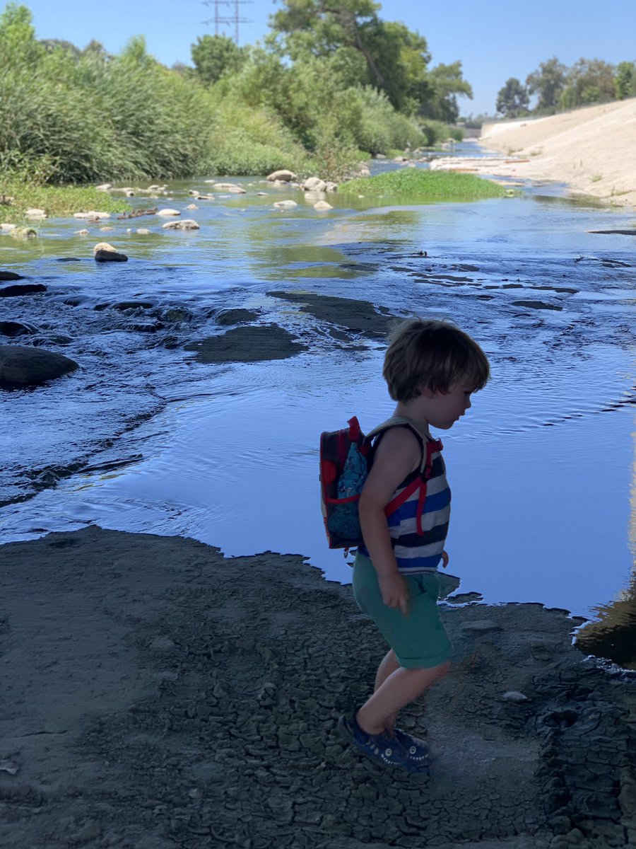 heathertyler's tweet photo. Exploring the L.A. River. Thanks to @KCRW @SteveChiotakis #GreaterLA for the tip! (And yes, he might’ve ‘dropped’ a leg in...) https://t.co/Iu64tYqu7W