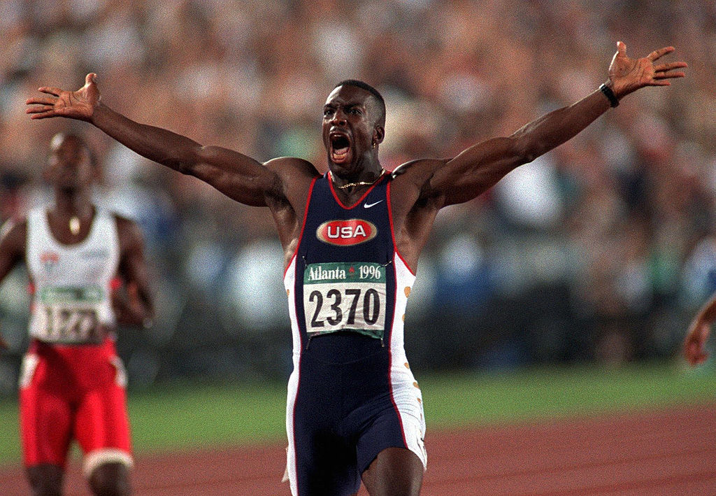 ESPNInsights's tweet photo. On this date in 1996, Michael Johnson became the 1st man to win the 200m and 400m at the same Olympics when he wins the men’s 200m in Atlanta in a then world-record time of 19.32 seconds. https://t.co/tnBsY1e3MK