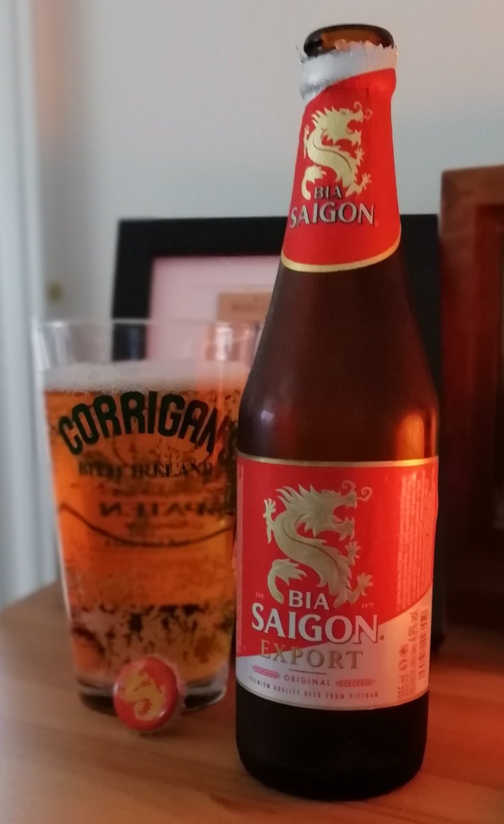 I loved Vietnam. It was hot, sticky, exhausting - that made the beer taste awesome! Cold, dirt cheap, poured haphazardly at the side of the st. That's what this bottle of Saigon reminded me of: today was hot & muggy so it went well with my pizza & salad...but I poured carefully!