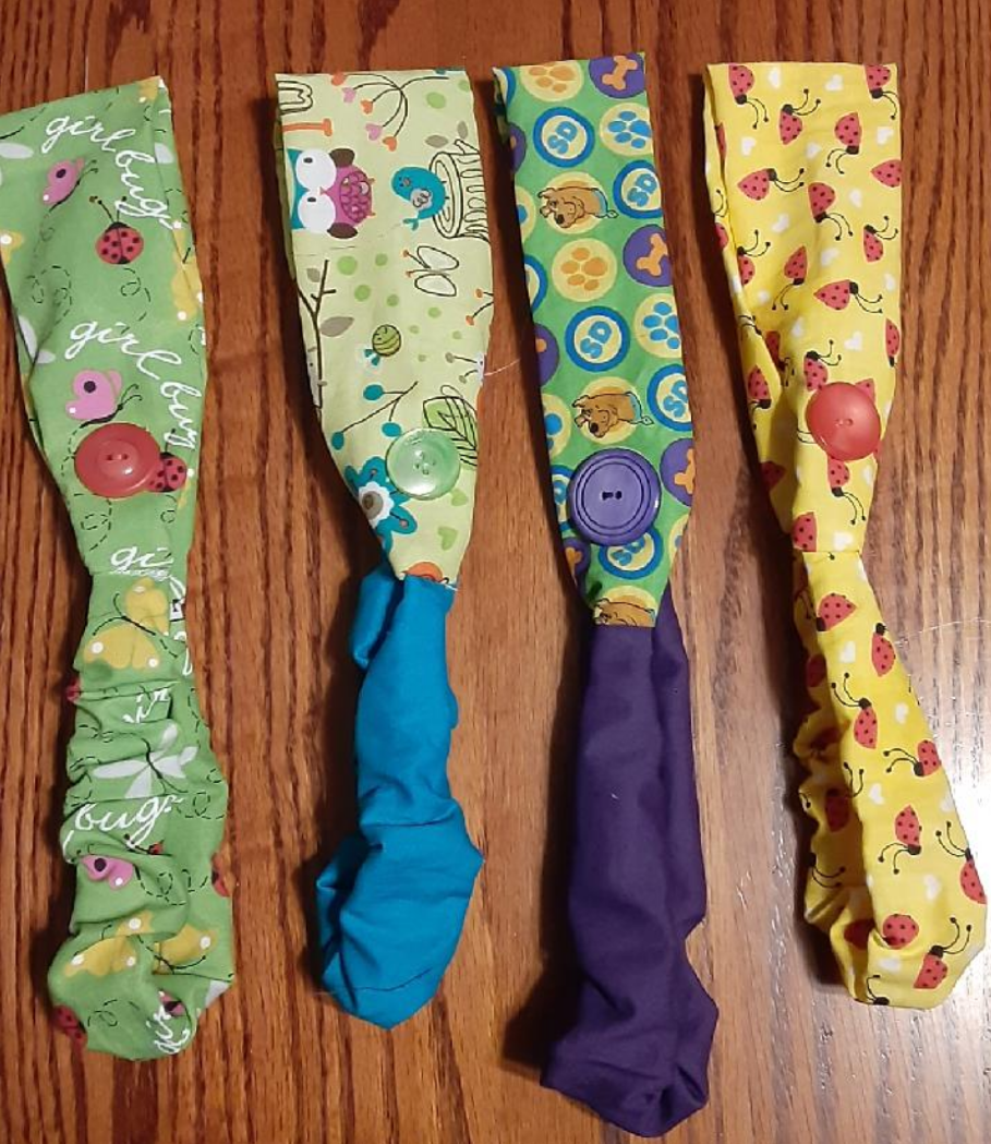 RoadRulesCamp's tweet photo. A few excellent projects and missions from today. Button headbands and a fleece blanket made by Elizabeth, positive graffiti by Sara, and a heating bag by Daniel. But wait, there's more! https://t.co/PSOSp1tMFp