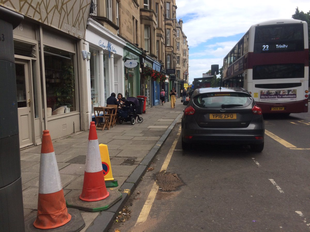 Interesting - cone removers have tables outside their business taking up pavement space - lovely to see people eating outside with  #spacesforpeople but taking up pavement and removing cones?  #cakeandeatingit