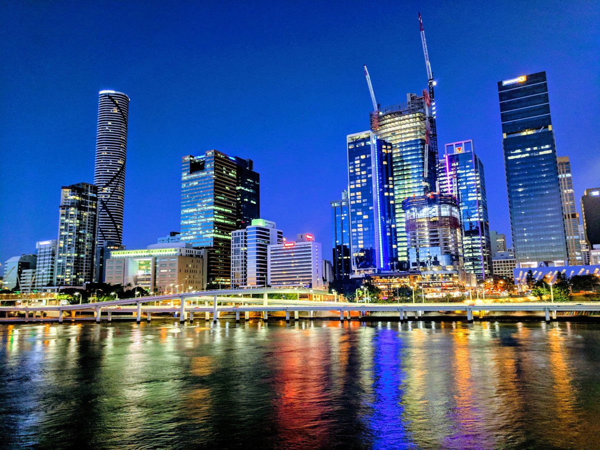 City of Brisbane reflected in the river lit up at night