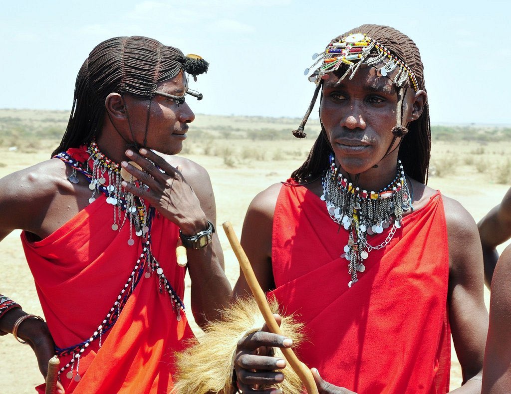 Nala (who is played by South African artist Nandi Madida) is readied by her bridesmaids while they wear jewelry and hairstyles inspired by the Maasai of Eastern Africa.