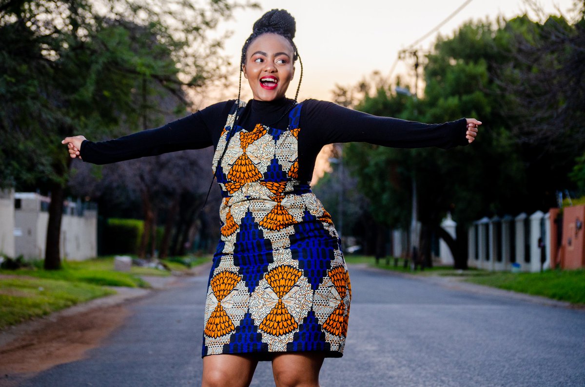 african print dungaree dress