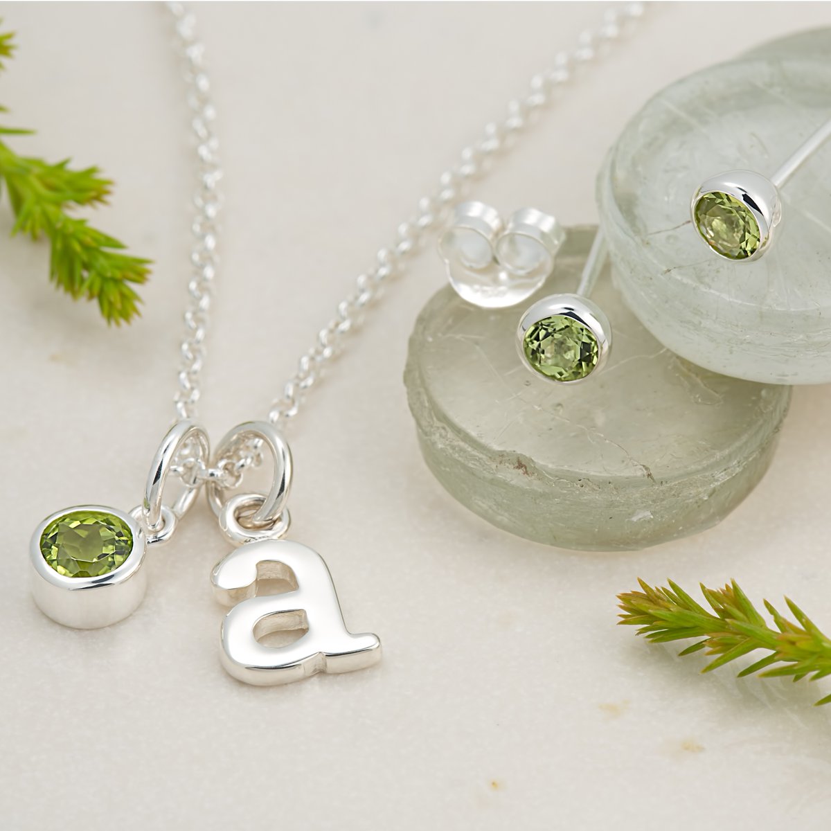 🍃August's birthstone, the  leafy green peridot. Set here in our new open ring design &amp; as faceted stud earrings &amp; necklace! Explore  all the month's best birthday gifts here lilycharmed.com/collections/au… 
#peridot #birthstone #august #leo #recycledsilver #sustainablegift #openring