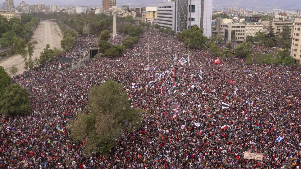 Here are aerial shots of about one million people marching in Chile.Now, imagine over three times that.