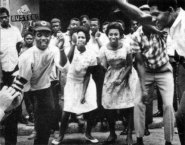 Prince Buster and friends dancing the ska on Orange Street in Kingston, Jamaica, 1964.Courtesy Steady Rock Productions
