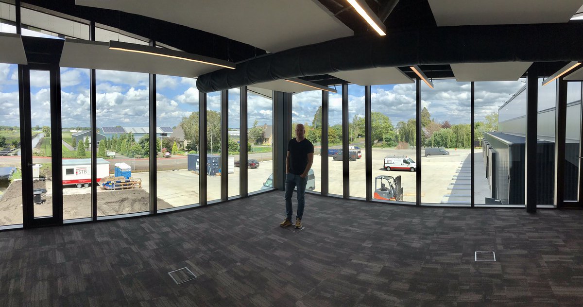 BootCoUK's tweet photo. Finishing touches are going on our new Head Office and warehouse in Boskoop. Featuring  a large photovoltaic array, ultra low energy triple glazing and state of the art heat pump and heat recovery ventilation for ultra low CO2 emissions : #greenbuilding #lowCO2 #solarelectric https://t.co/c76TmchYBA