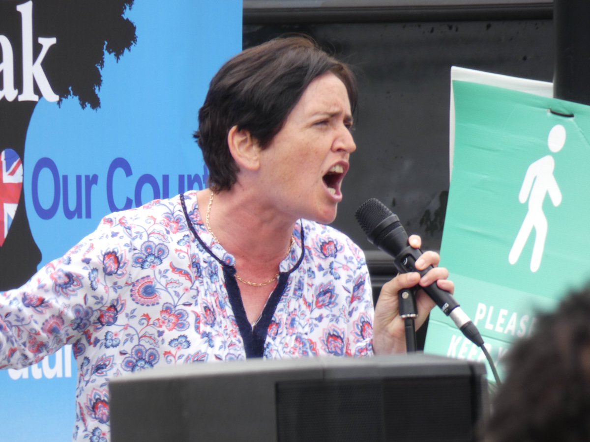 Anne Marie Waters the leader of the anti-Islam For Britain party takes the stage and rails against the government and the “evil press” vowing revenge against them if a For Britain government were elected saying the press will be “taught a lesson you will never forget.”