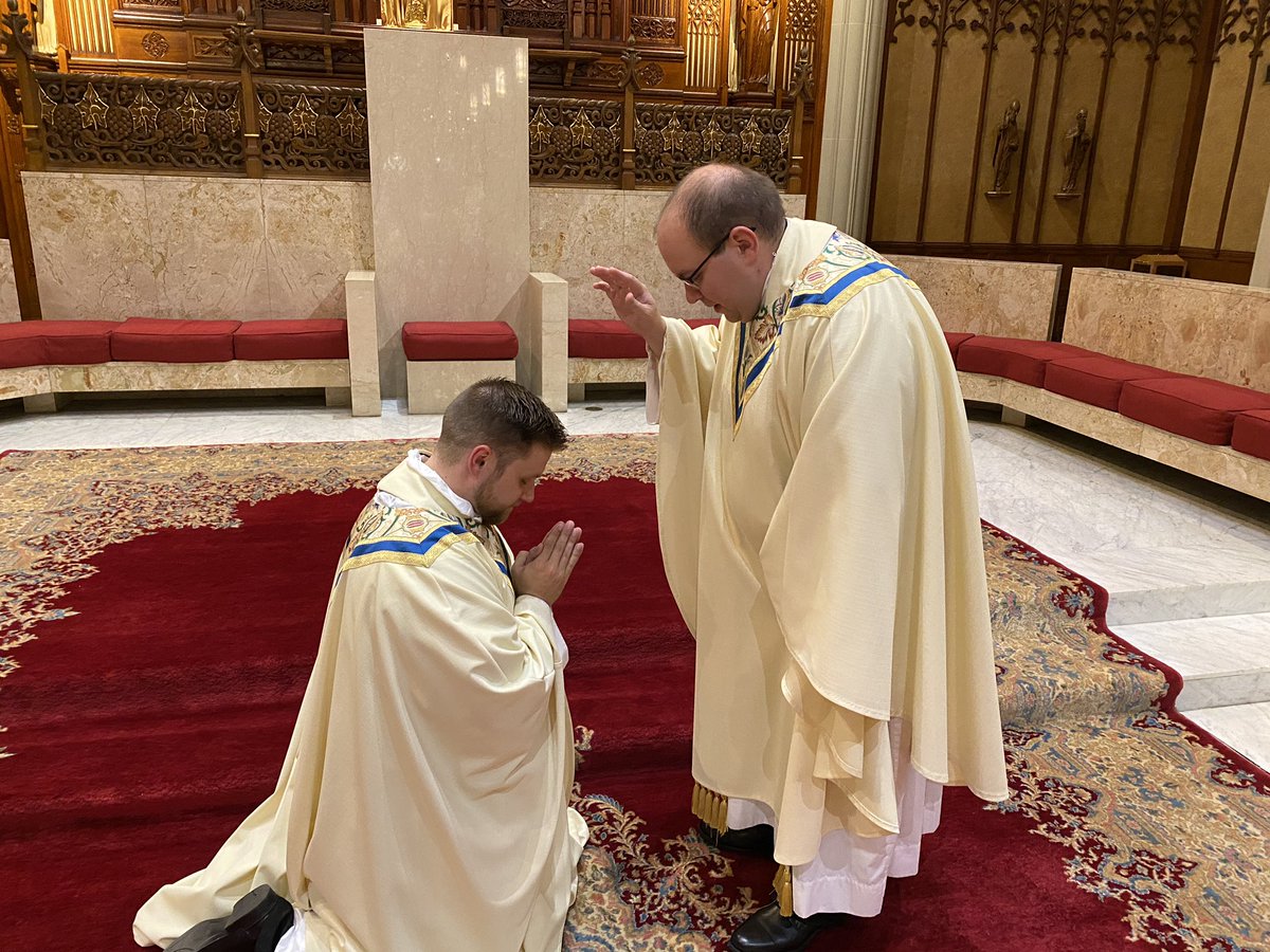 DIOCESEofCLE's tweet photo. Following their ordination, Fr. Joe and Fr. Josh bestowed a blessing on each other. #CLEOrdination https://t.co/Sggppah8PL