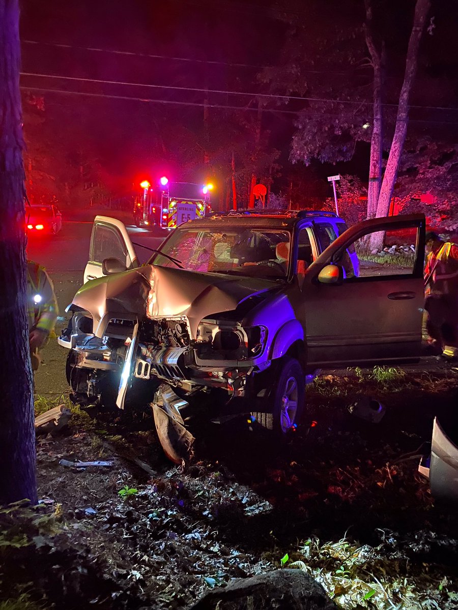 FDSterling's tweet photo. An overnight crash resulted in the temporary closure of Beaman Rd and one occupant of the vehicle transported to Clinton Hospital with minor injuries. The single vehicle crashed into a tree when the driver seems to have lost control. (Photos T.Gianos) #sterlingma #sterlingfire https://t.co/ik5OruZERX