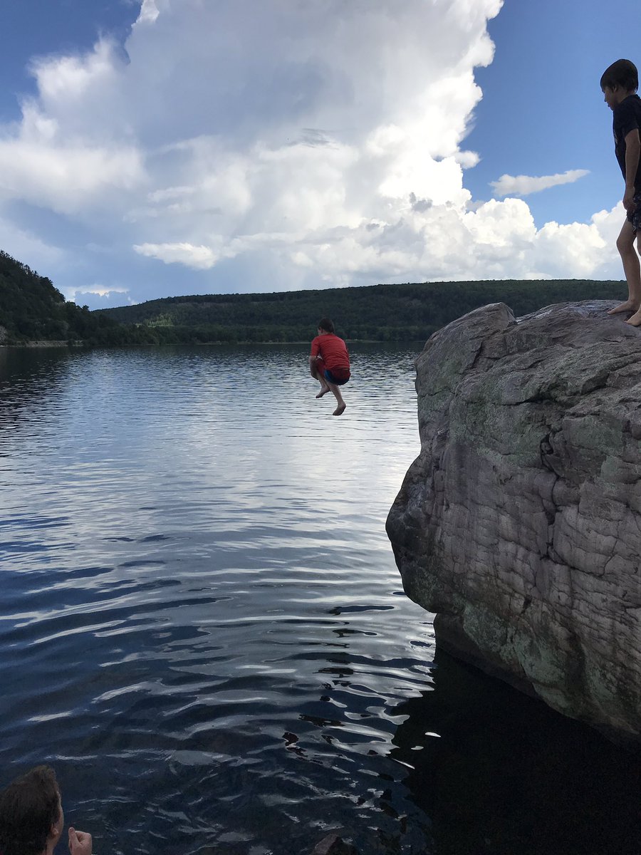 Jbmb155's tweet photo. Jumping off the rock at Devils Lake State Park. The rainbow that popped out was pretty awesome too!  One of our favorite summertime moments!!!
@LumosLearning 
#LumosLearning
#SummerLearning https://t.co/q5QboCjO1j