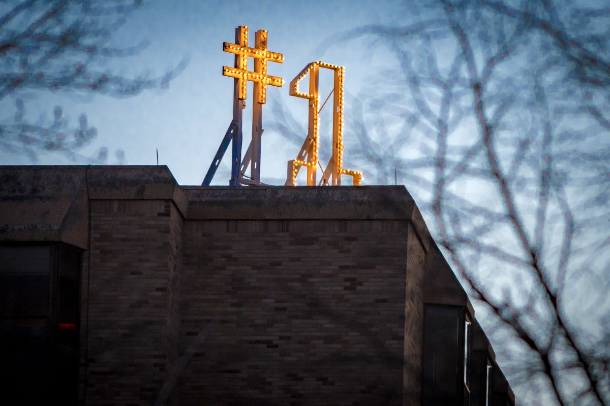 NDAlumni's tweet photo. Grace served as a residence hall from 1969-1996. Its trademark #1 sign is lit anytime an ND team reaches the top spot in the rankings. Grace Lightning alums include University President Rev. John I. Jenkins, C.S.C, '76, '78 M.A., and Raghib "Rocket" Ismail '94. #DormsofND https://t.co/Yest68XrZC