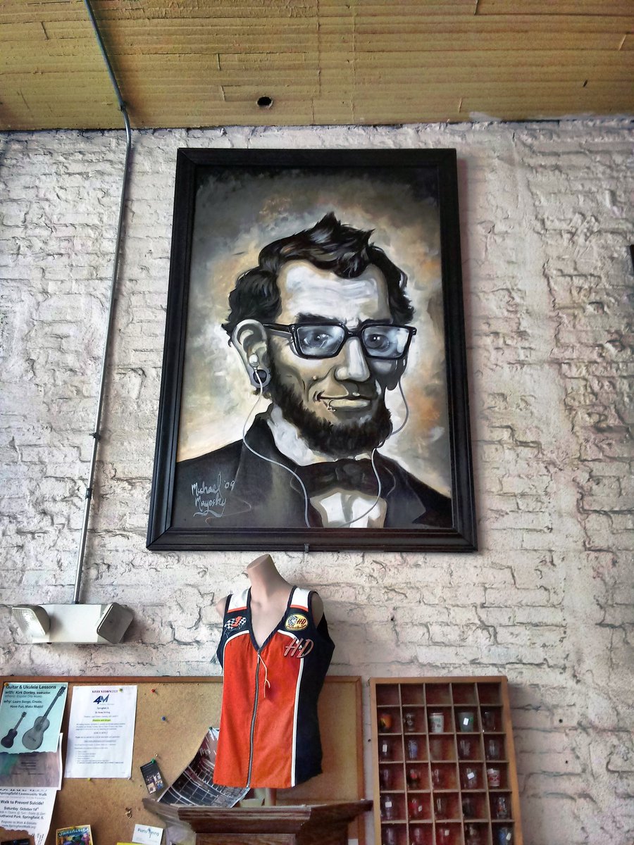 This abraham lincoln painting is at recycled records on adams street in downtown springfield,illinois