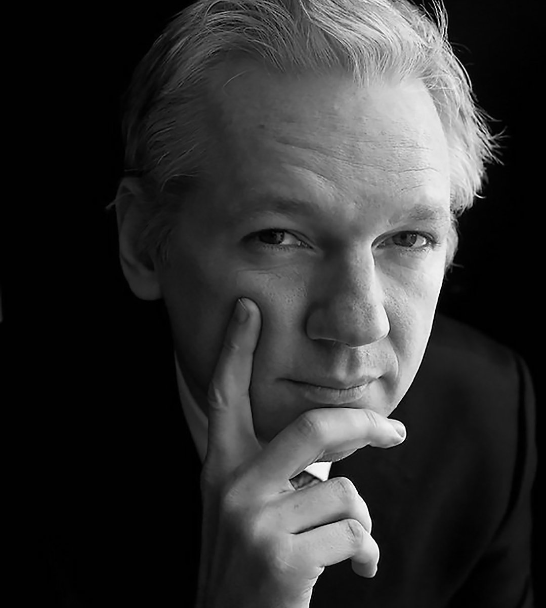 This Is Julian Assange, Born Julian Paul Hawkins, An Australian Editor, Publisher, And Activist Who Founded WikiLeaks In 2006, Roughly Ten Years Before Donald J. Trump Announces His Run For The U.S. Presidency.