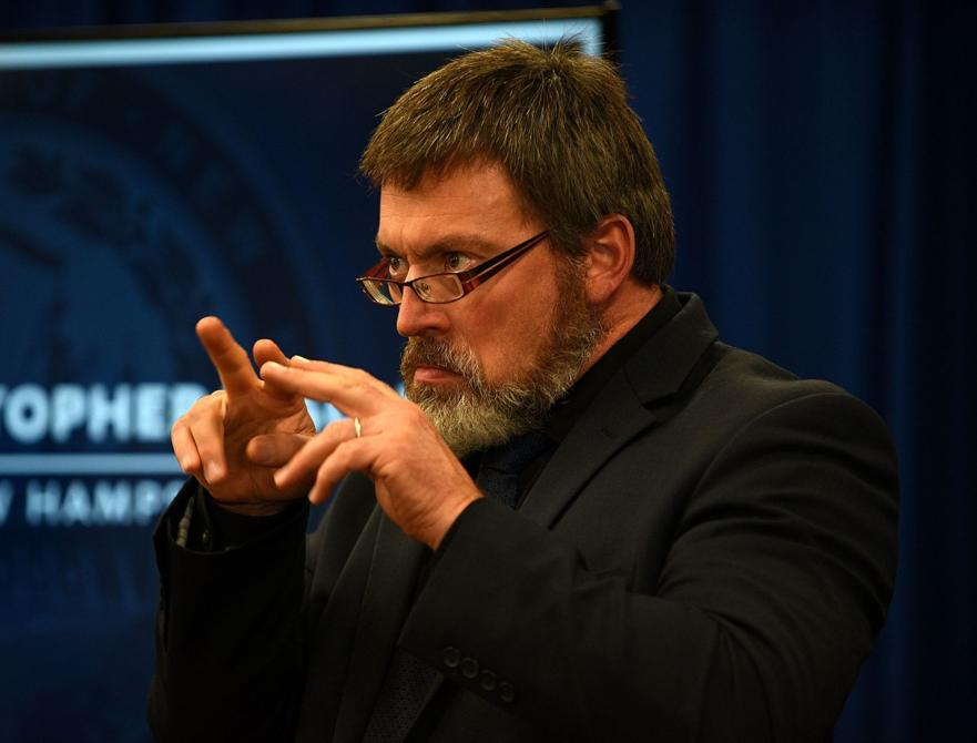 UnionLeader's tweet photo. In the low-ceilinged room in Concord where the governor briefs the media, interpreter David Krueger, dressed in dark clothes to not distract from his hands, stands to the side and signs the latest on the pandemic for the deaf.
https://t.co/loOmKZ43d9 https://t.co/tBSIBz1a3N