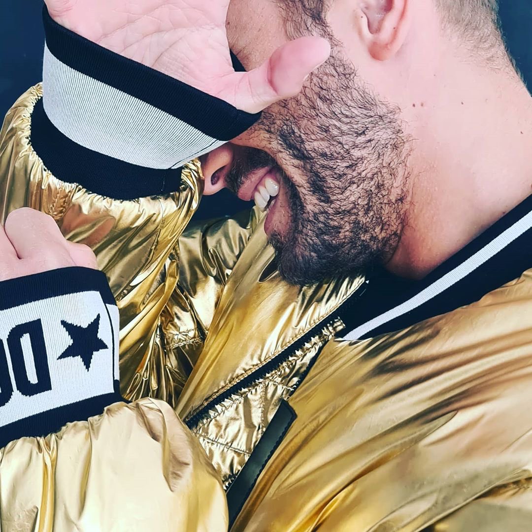 Repost from <a href="/pabloalboran/">Pablo Alborán</a> 
Pablo Alborán wears a metalized nylon gold #DolceGabbana jacket with a patch. 
#DGCelebs #DGFamily