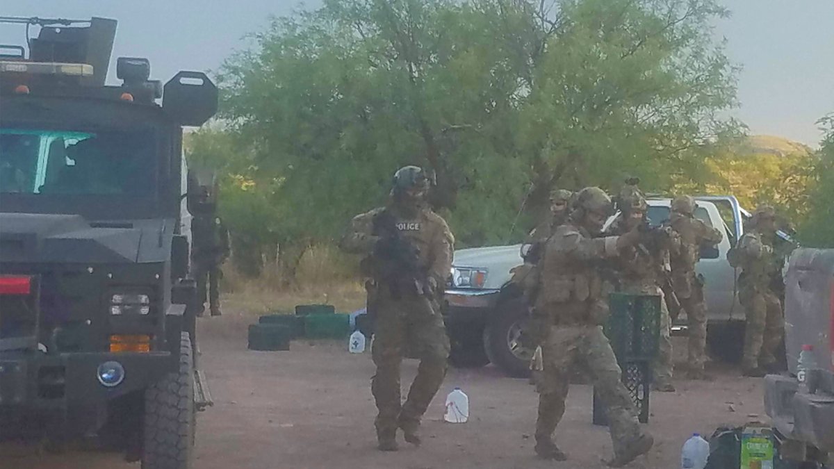 UR_Ninja's tweet photo. The govt ramped up its efforts to stop humanitarian workers on the U.S.-Mexico border on July 31, with a "military style raid" with helicopters, armored vehicles, Border Patrol &amp; BORTAC, arresting 30+ people at the volunteer-run @NoMoreDeaths aid camp.

>https://t.co/JCzC7mV0T1< https://t.co/qaFm8qFEir