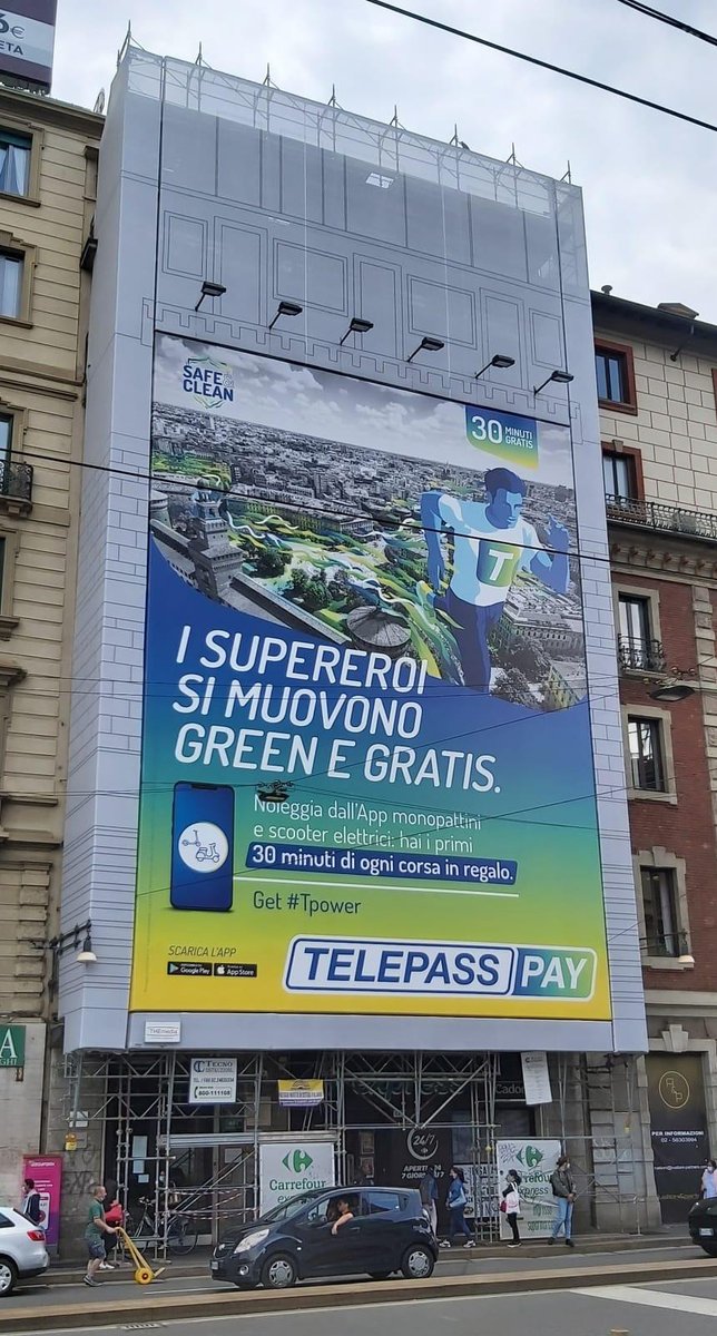sunspeker's tweet photo. Anche @telepass sceglie l'#OOH con un grosso #Billboard sulla facciata di un cantiere, per promuovere la #SmartMobility con il suo progetto #SafeAndClean mediante l'app #TelepassPay. Un bel mix che la tecnologia del #SASbuilding racchiude dentro di se. #BeSmartBeSunny @GabriBen https://t.co/O2UElodwa4