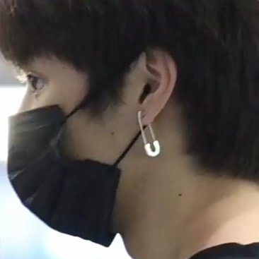 + sunwoo wearing a safety pin earing and being aware of the meaning behind it