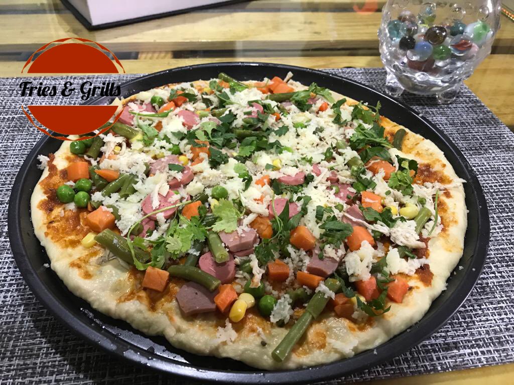 FriesNGrills's tweet photo. Look what we made 🍕 https://t.co/P4UoILfNYE