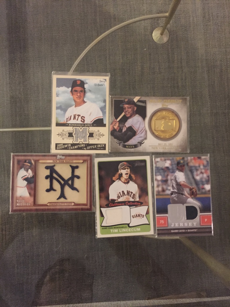 Giants:Gaylord Perry relic: $5Willie Mays manufactured coin: $5Willie McCovery manufactured patch (has some damage): $4Tim Lincecum relic (has some damage): $3Barry Zito relic: $3