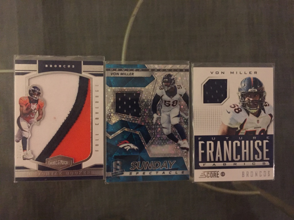 Broncos:DeVontae Booker patch /50: $7Von Miller relic /99: $7Von Miller relic (has corner ding): $6