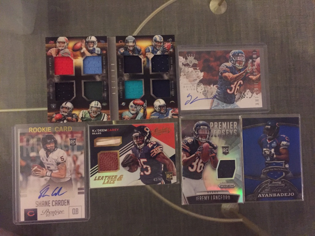 Bears:8x relic booklet /199 with Kevin White: $20Jeremy Langford auto /249: $5Shane Carden auto: $3Ka’Deem Carey dual relic /42: $3Jeremy Langford relic: $2Brendon Ayanbadejo relic: $2