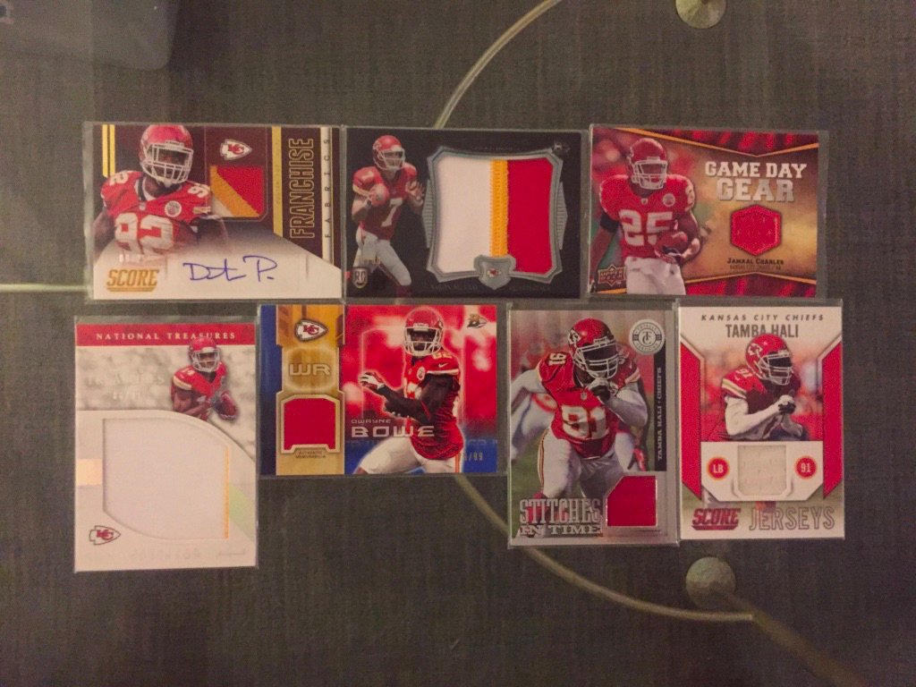Chiefs:Dontari Poe RPA /25: $10Aaron Murray patch /50: $7Jamaal Charles relic: $6DeMarcus Robinson patch /99: $4Dwayne Bowe relic /99: $3Tamba Hali relics (TC /299): $3 each