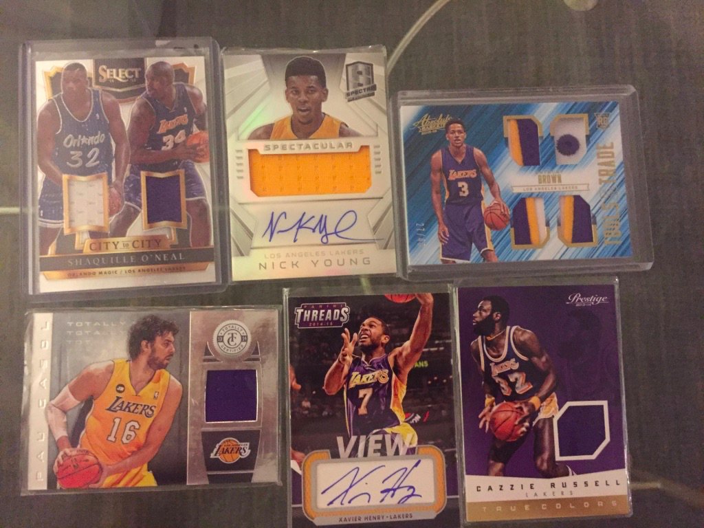 Lakers:  Shaquille O’Neal dual relic /199: $20Nick Young auto relic /49: $10Anthony Brown quad patch /49: $8Pau Gasol relic: $4Xavier Henry auto: $4Cazzie Russell relic: $4