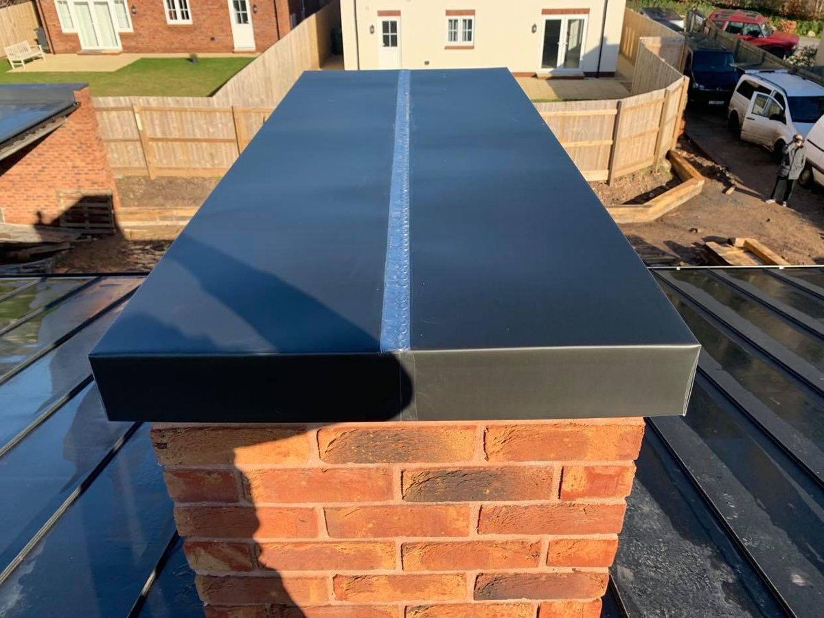 Now this isn't something we do everyday, a nice detail to cap off a faux chimney.
We think the VMzinc Anthra Strat looks great alongside the red brick.
#vmzinc #anthra #redbrick #details #roof #chimney #tomahawkhomes