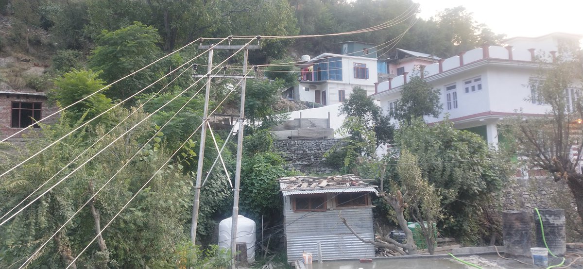 SamarBhat7's tweet photo. RT it please. 1/n
There is a 11kV wire running in front of my home at a hands distance the wire is so close that we feel current at times when it rains. 5 days ago the wires came a little more down touched a mobile phone pole and and we just got lucky and survived https://t.co/NGsG83lkh6