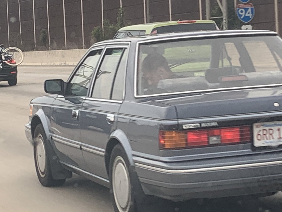 ChicagoSpotter's tweet photo. An early @NissanUSA #Maxima in decent shape considering its plates are from Massachusetts. Notably missing was the #4DSC decal in the rear quarter window. #survivor #carspotter https://t.co/yRnE9UyFG9