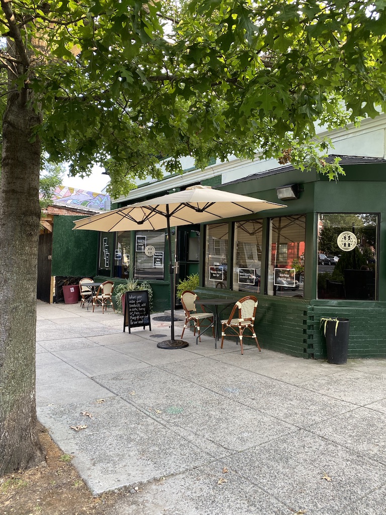 New umbrella for our new hours. Coffee and Breakfast sandwiches starting at 9am for our informal cafe service.