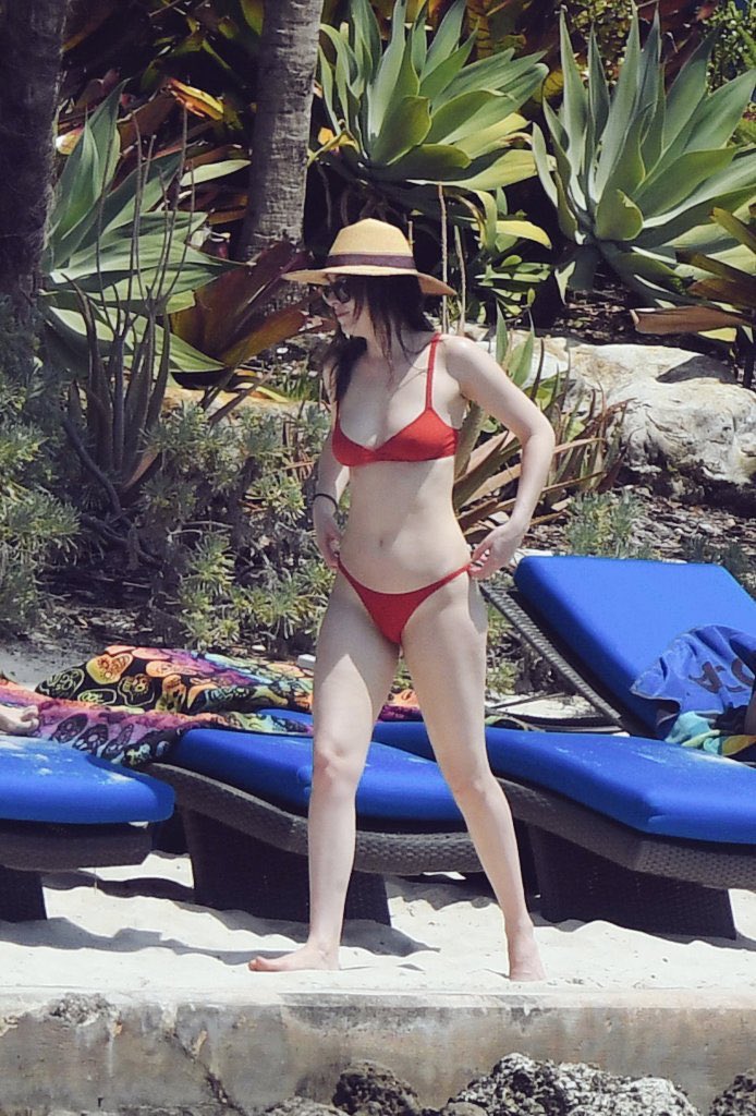 dakota johnson and swimwear. a thread. part one.