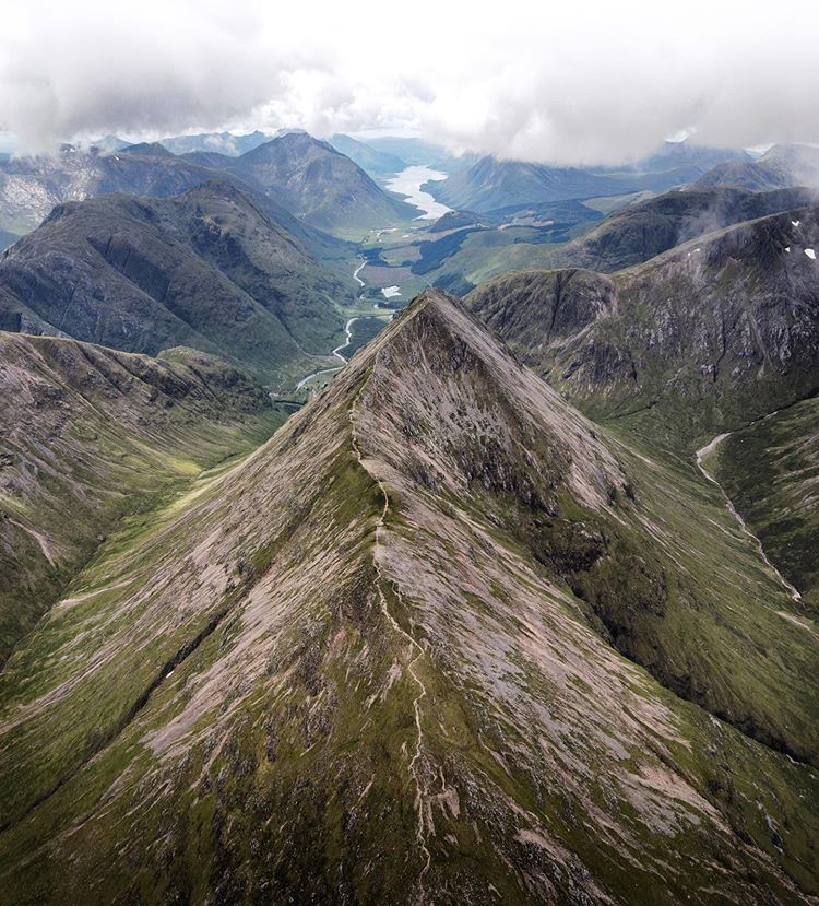 VisitScotland's tweet photo. There's nae doubt a trip to the #Highlands is something you'll never forget ❣️⛰️ #StaySafe 📍 Glen Coe 📷 IG/russell_davies https://t.co/mRZApLtRtO