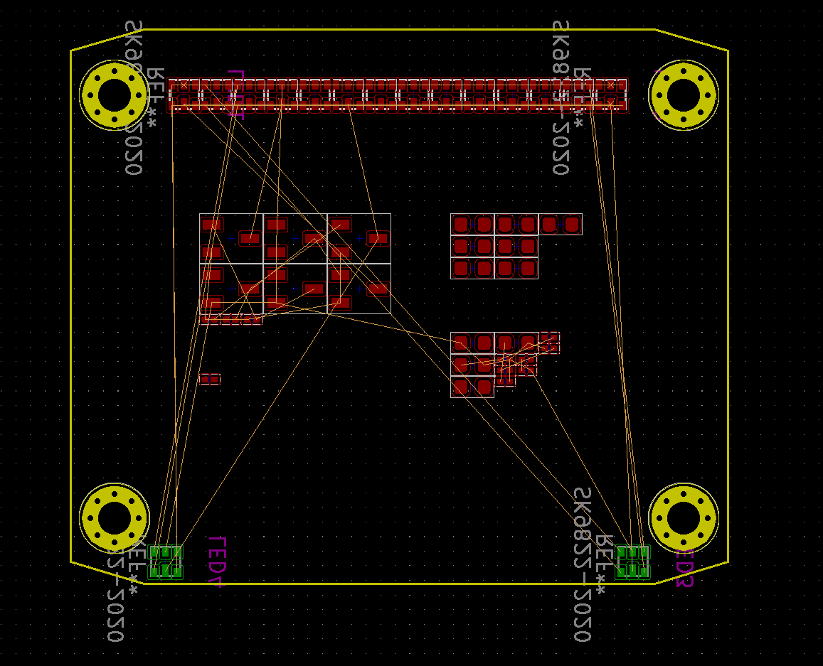 The day ends and we start thinking about the (yet also unnamed) "top board". The layout is very bare bones at the moment: A few resistors, transistors and RGB LEDs.