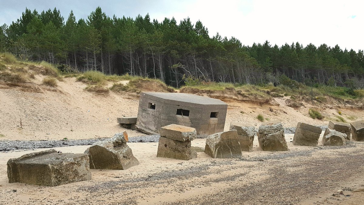 A few miles to the west you'll find Roseisle Beach. Canadian and American troops staged a full scale live ammunition rehearsal for D-Day here in March 1944. Damage to the pillboxes and blocks are still visible.