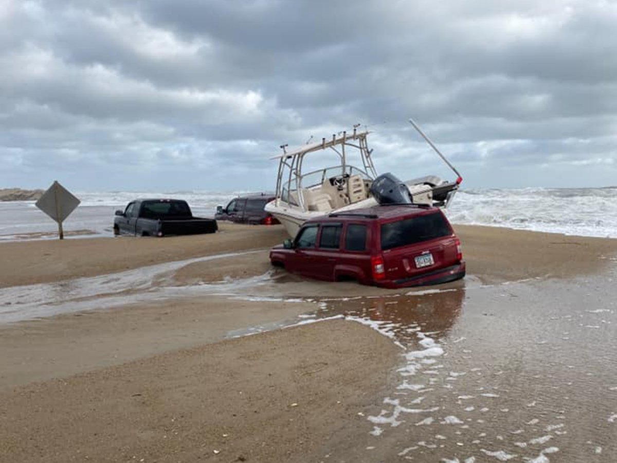 DareCountyEM's tweet photo. In Oct 2019, Highway 12 saw impacts from a coastal storm. This is what vulnerability means on the only road on and off #HatterasIsland. Took days to clean it up! Let’s not let #Isaias ruin your day. 

(pic c/o Waters Edge - Rodanthe) https://t.co/I1NgkyoUYd